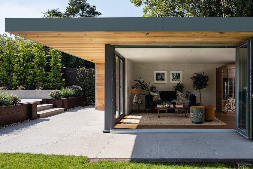 Bespoke garden room with overhang