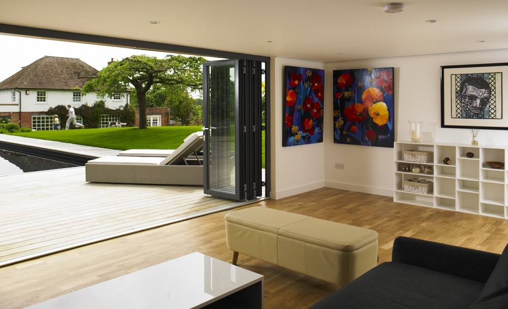 Bifolding double glazed doors for a garden studio by Rooms Outdoor