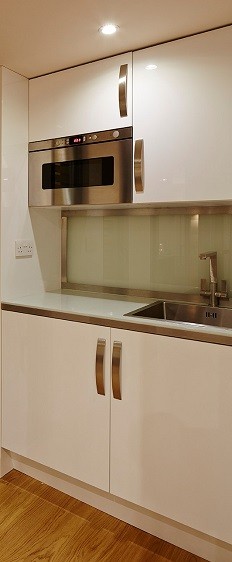 Kitchenette in a self-contained studio designed by Rooms Outdoor in Seer Green