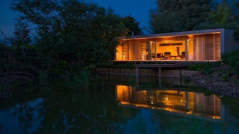 Weekend retreat on the Norfolk Broads, combining contemporary design in a rural setting overlooking a lake.