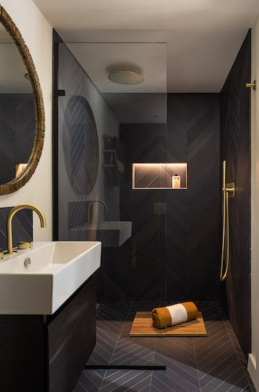 Bespoke dark toned shower room for a garden room