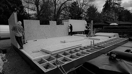 Construction works for a bespoke garden room with swimmingpool