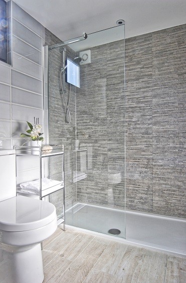 A bespoke shower room by Rooms Outdoor for one self-contained garden studio